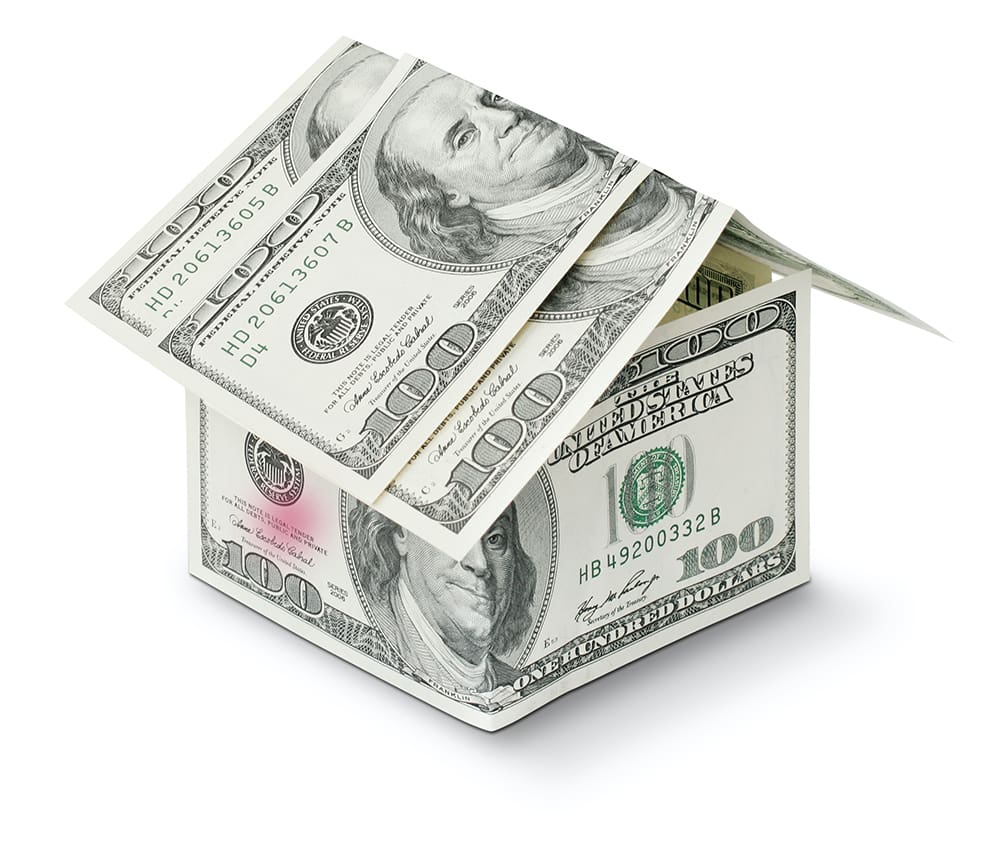 House shape created out of 100 dollar US bills